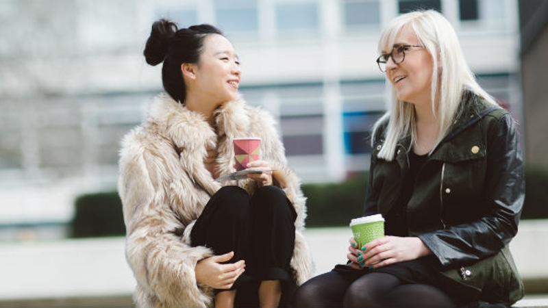 Students laughing on campus