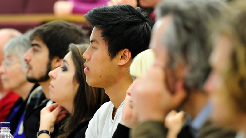 Group of students listening to a lecture