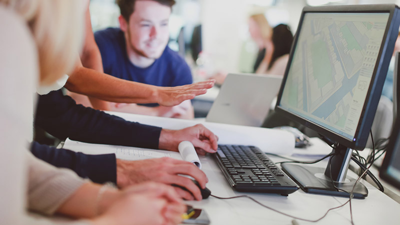 Students using construction software on a computer