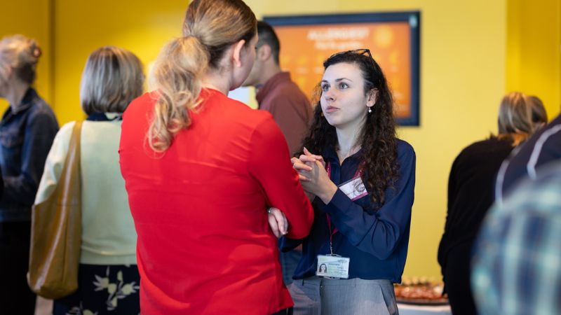 two people talking at a brookes event
