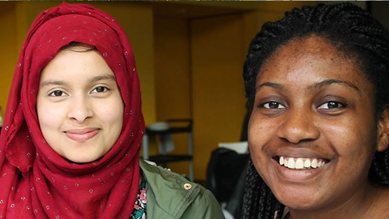 Two smiling teenage girls