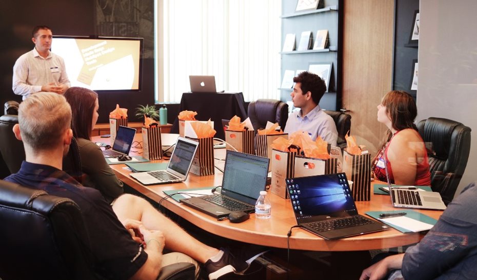 team meeting at an oval desk