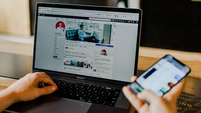 Social media on laptop and phone