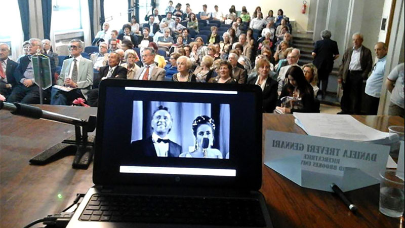 Daniela presenting at a conference