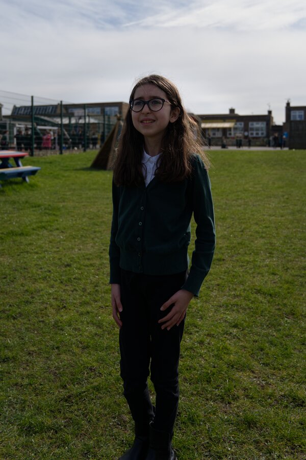 Pupil being interviewed on the school field