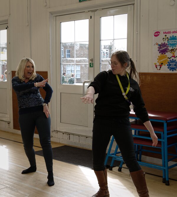 Two ladies dancing