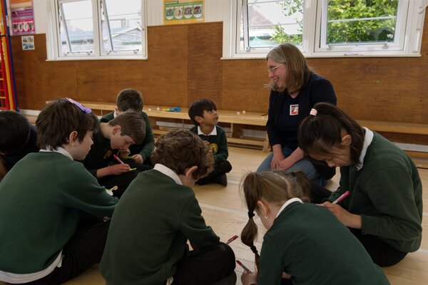 Children sat listening to a story