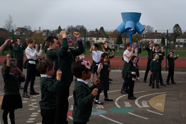 Pupils dancing in the playground