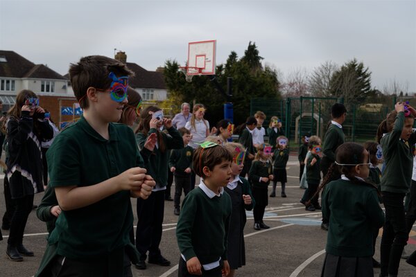 Pupils dancing in the playground