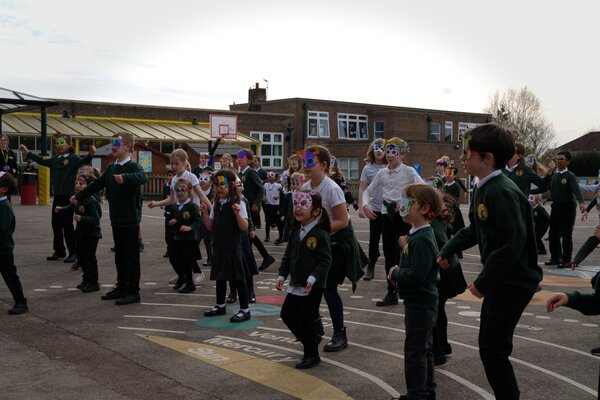Pupils dancing in the playground