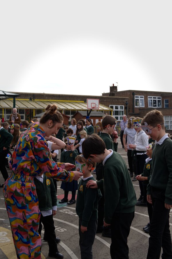 Instructors and children in the playground