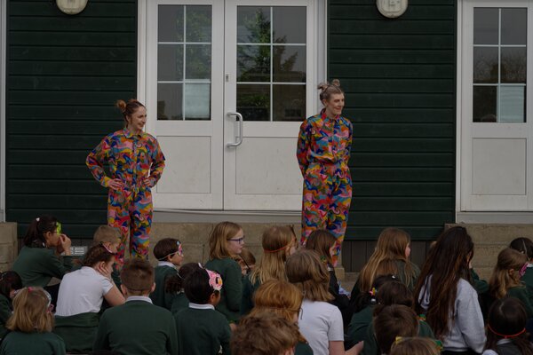 Pupils dancing in the playground