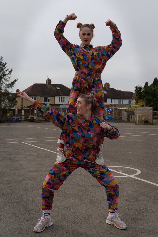 Instructors dancing in the playground