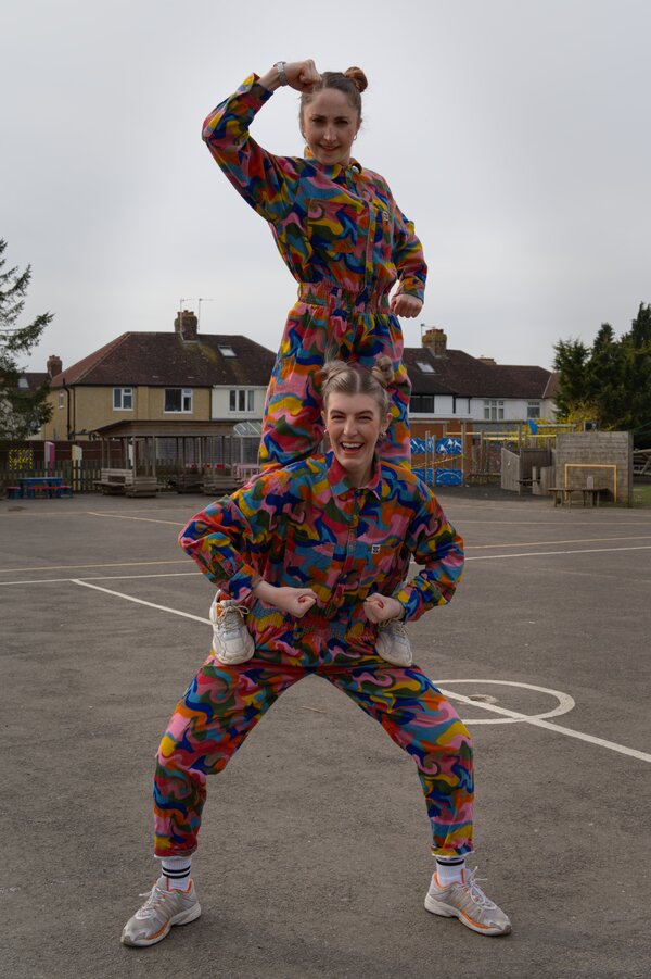 Instructors dancing in the playground