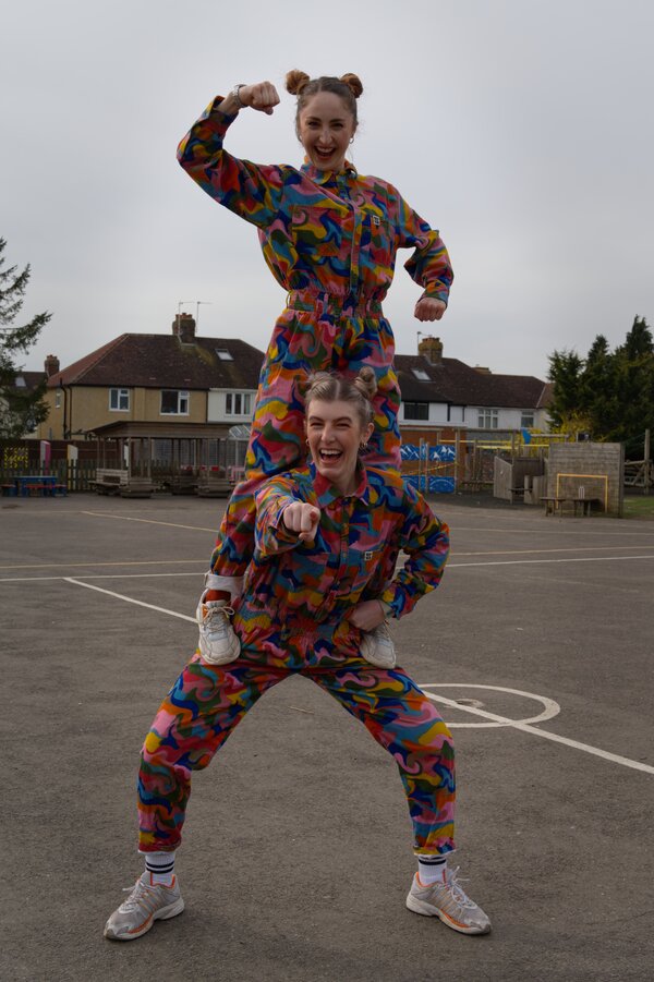 Instructors dancing in the playground