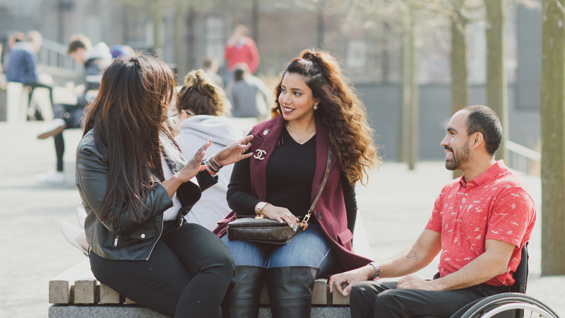 Students chatting in front of JHBB