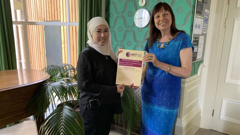 student with certificate
