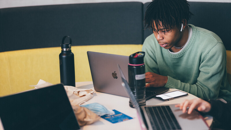 Student looking at laptop