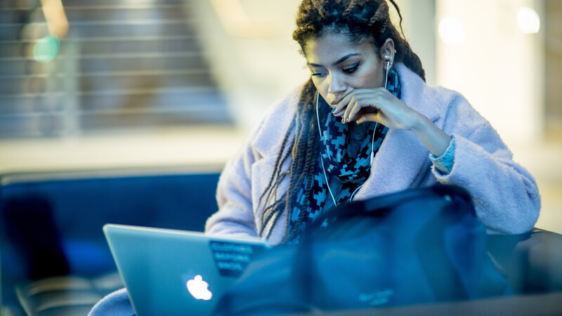 Student looking at a laptop
