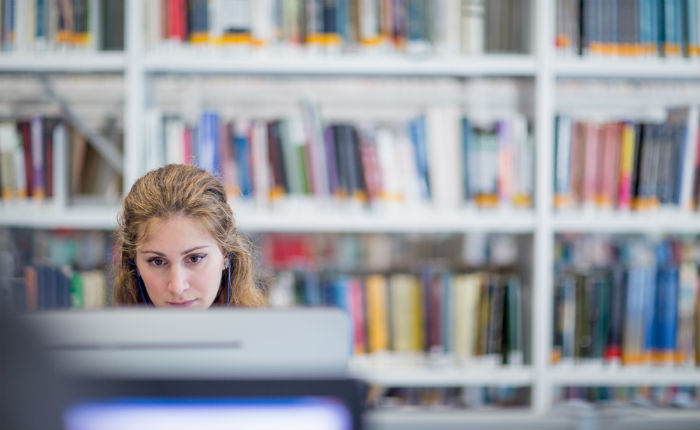 Student working in the library