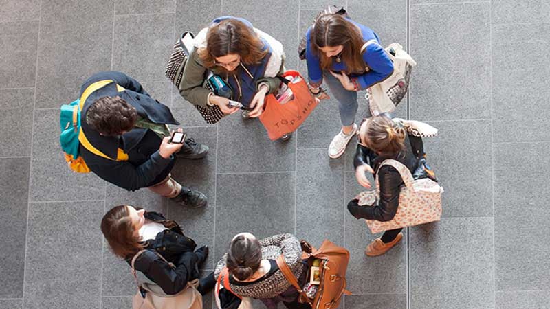 Students standing in a circle