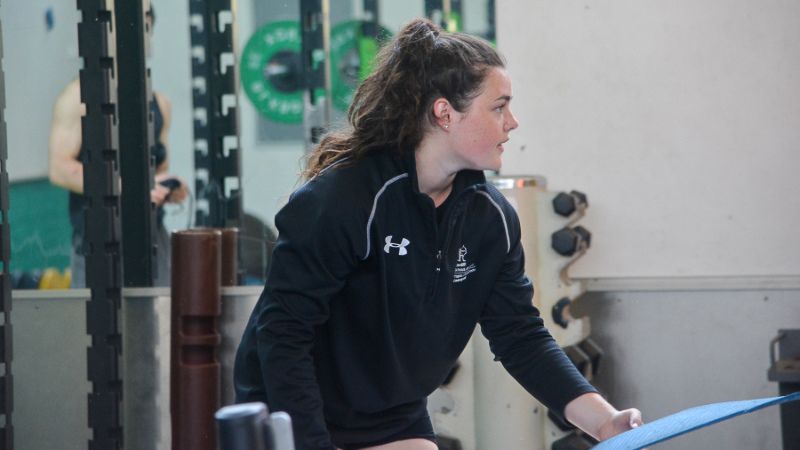 Anna Morgan exercising in gym