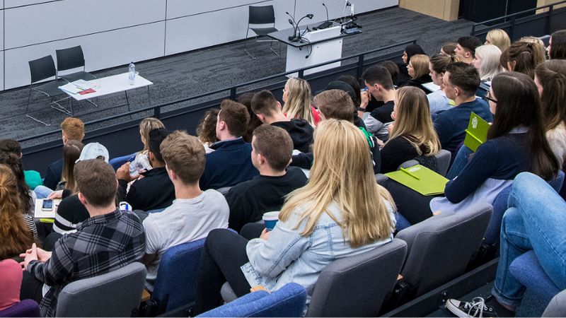 oxford brookes students at a lecture in a lecture theatre
