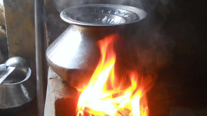 Pot cooking on a fire pit