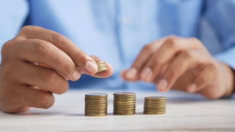 person countig coins