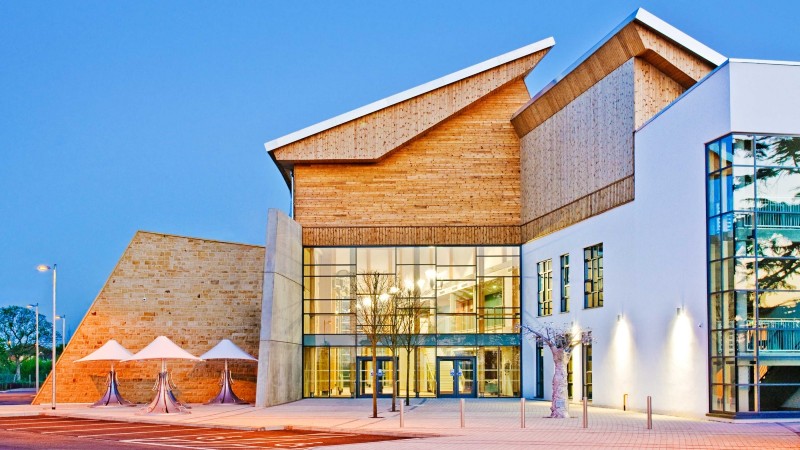 External view of the SusCon Building in low light