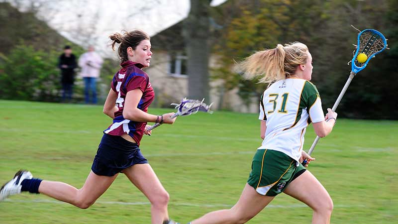 Students playing lacrosse
